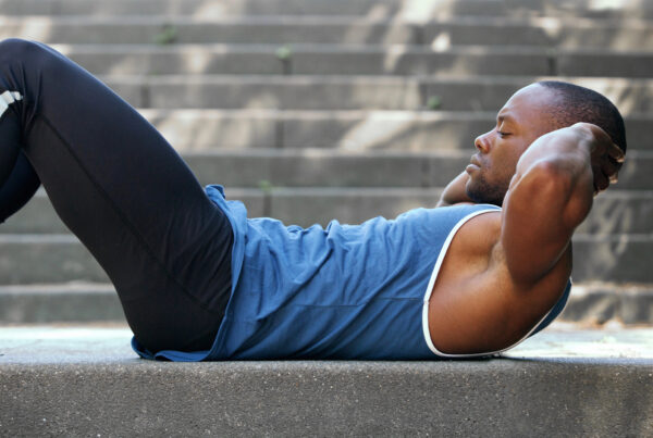 man doing crunches for ab exercise