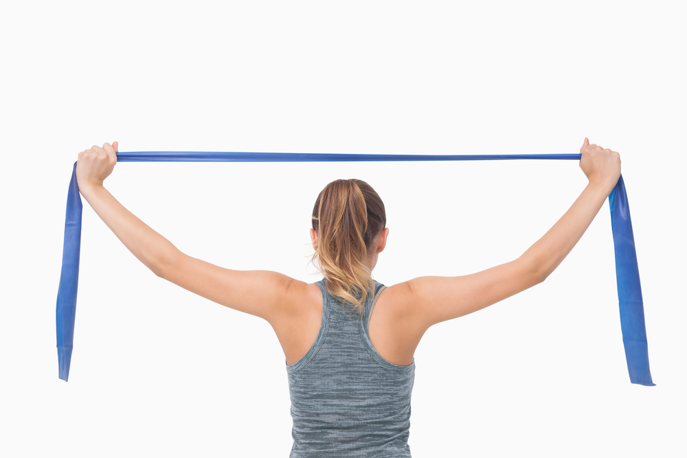 Overhead shoulder mobility exercise with resistance band